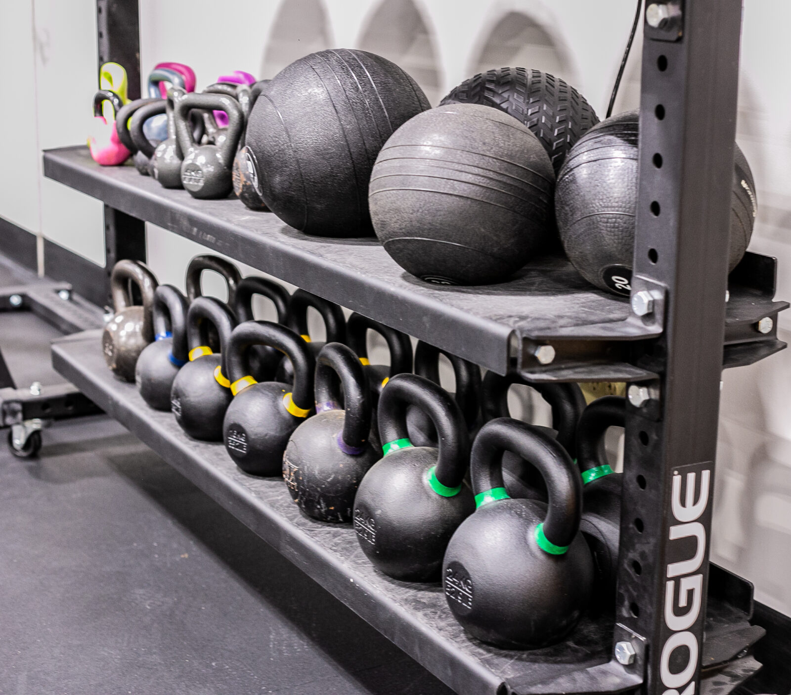 Shelf of gym equipment.